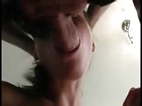 Young teen feeding and blowing
