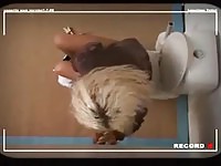 Sucking on a strainger's cock in public toilet