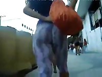 Sexy fitness girl caught walking down street
